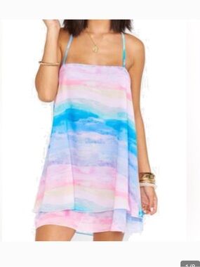 Show me your Mumu Christy Pastel Watercolor Mini Dress in MuMaid Waves
Size M